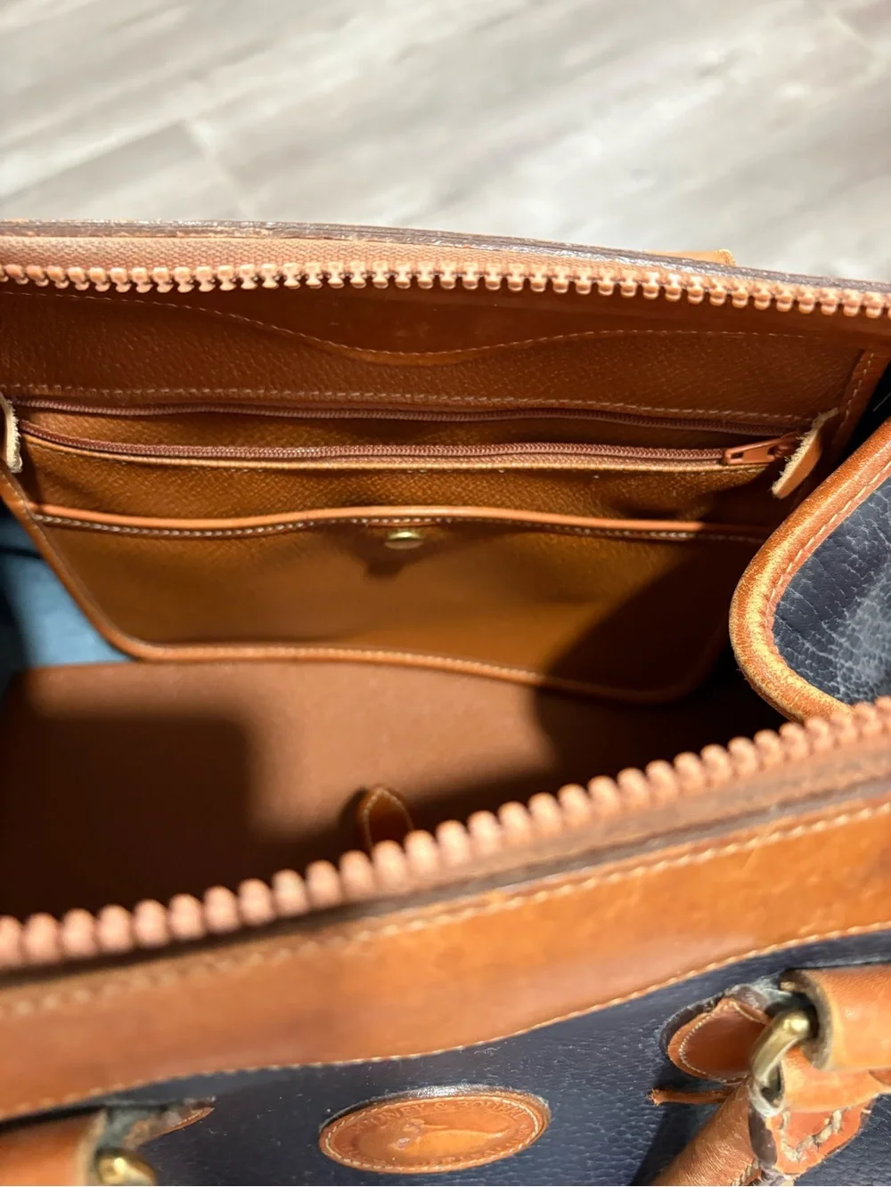 Dooney & Bourke Navy and Tan Pebbled Leather Doctor Bag